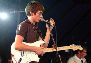 Alex Turner with a Fender Stratocaster