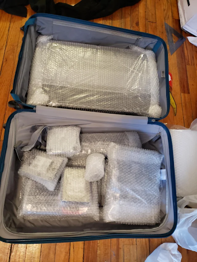 Luggage with items bubble wrapped