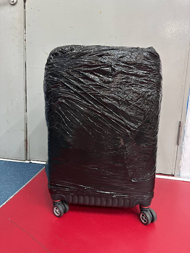 Shrink Wrapped Luggage